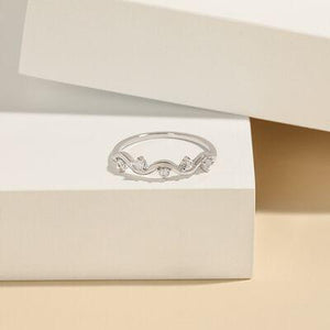 a close up of a ring in a box