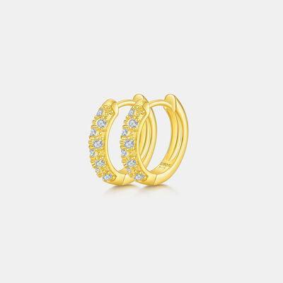 a pair of yellow gold hoop earrings with diamonds