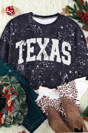 a sweater with the word texas printed on it