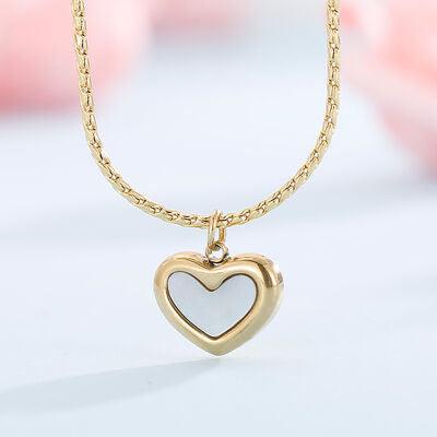 a necklace with a heart shaped pendant on a chain