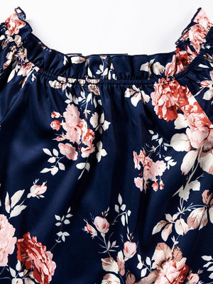 a close up of a dress with flowers on it