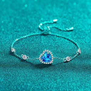 a bracelet with a blue heart on it