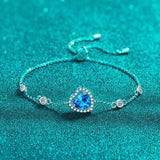 a bracelet with a blue heart on it