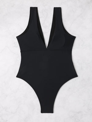 a black swimsuit with a cut out back