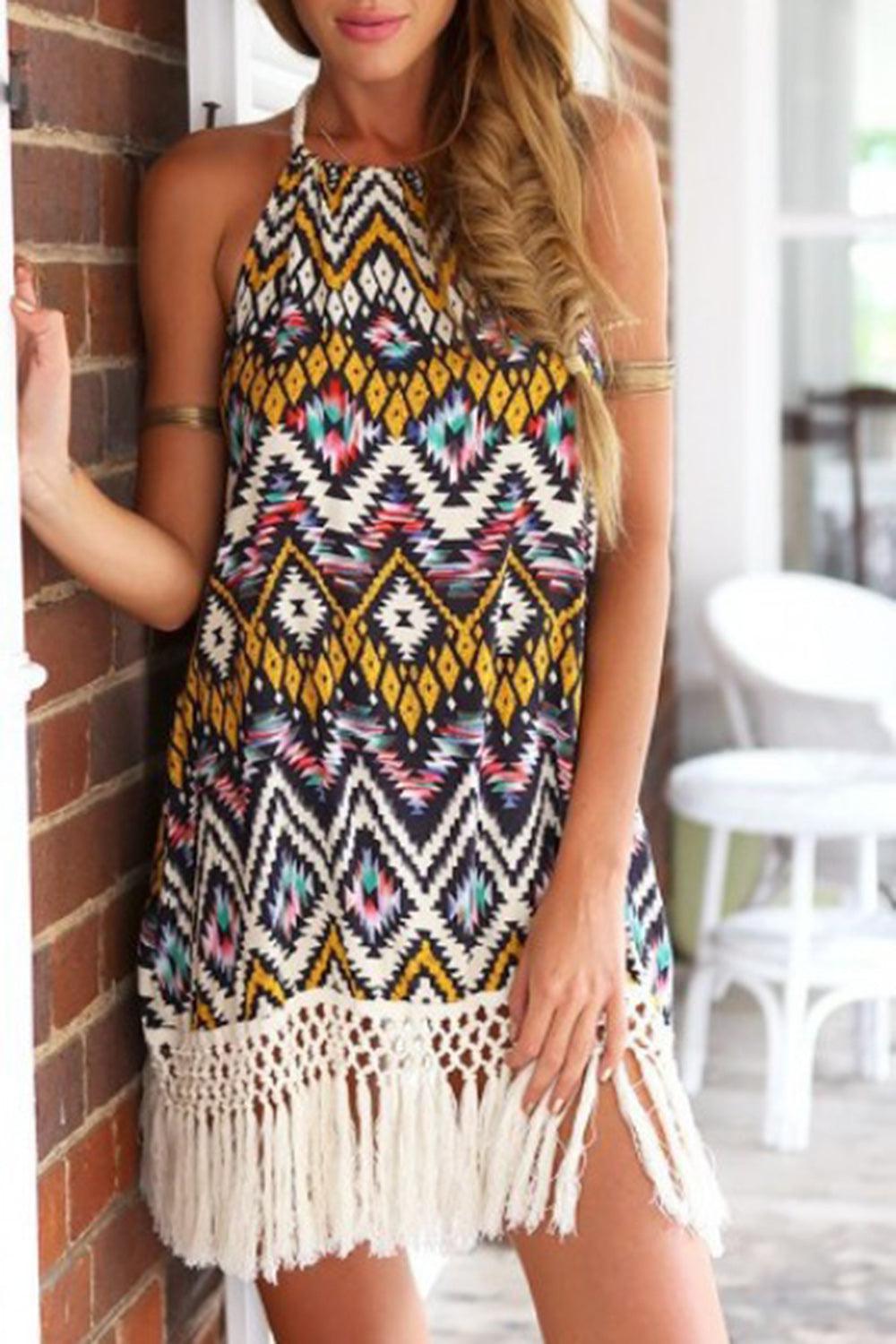 a beautiful woman leaning against a brick wall