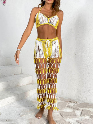 a woman wearing a yellow and white crochet set