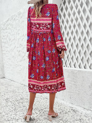 a woman in a red dress and a hat