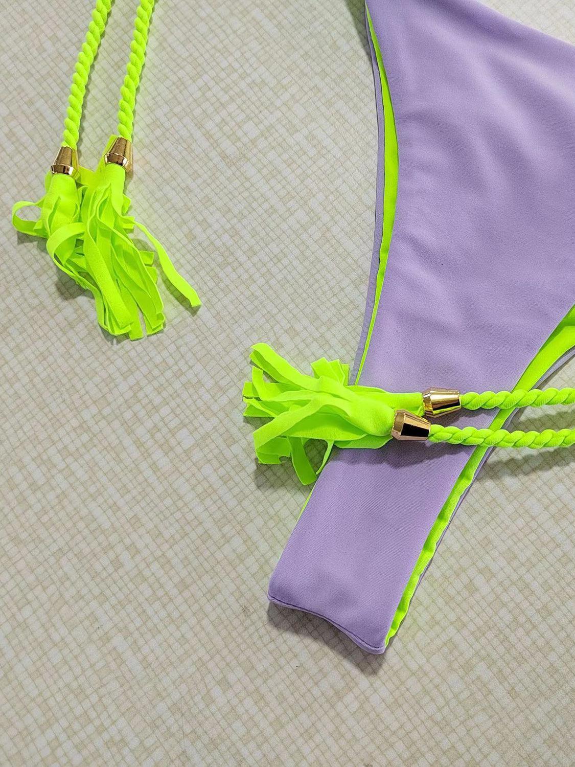 a pair of neon green and purple bras