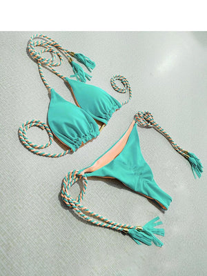 a bikini top with a rope attached to it
