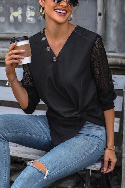 a woman sitting on a bench holding a cup of coffee