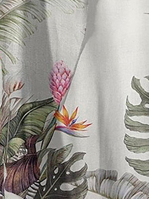 a curtain with a tropical print on it