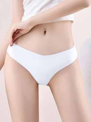 a woman in a white panties with her hand on her hip