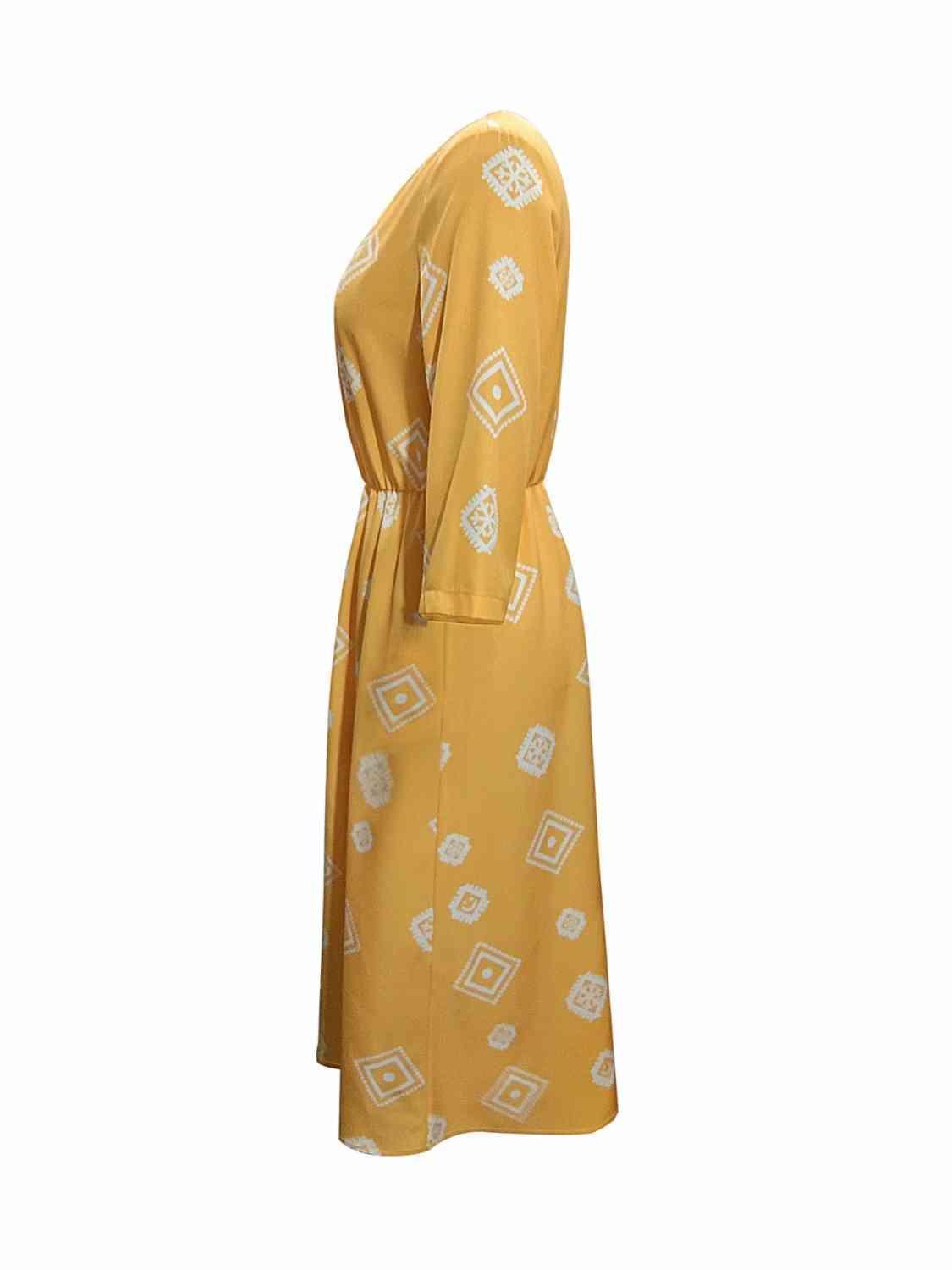 a yellow robe with a pattern on it