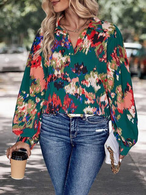 a woman walking down a street holding a cup of coffee