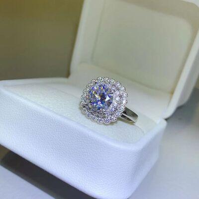 a diamond ring in a box on a table