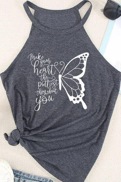 a women's tank top with a butterfly on it