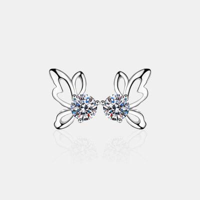 a pair of earrings with butterfly wings