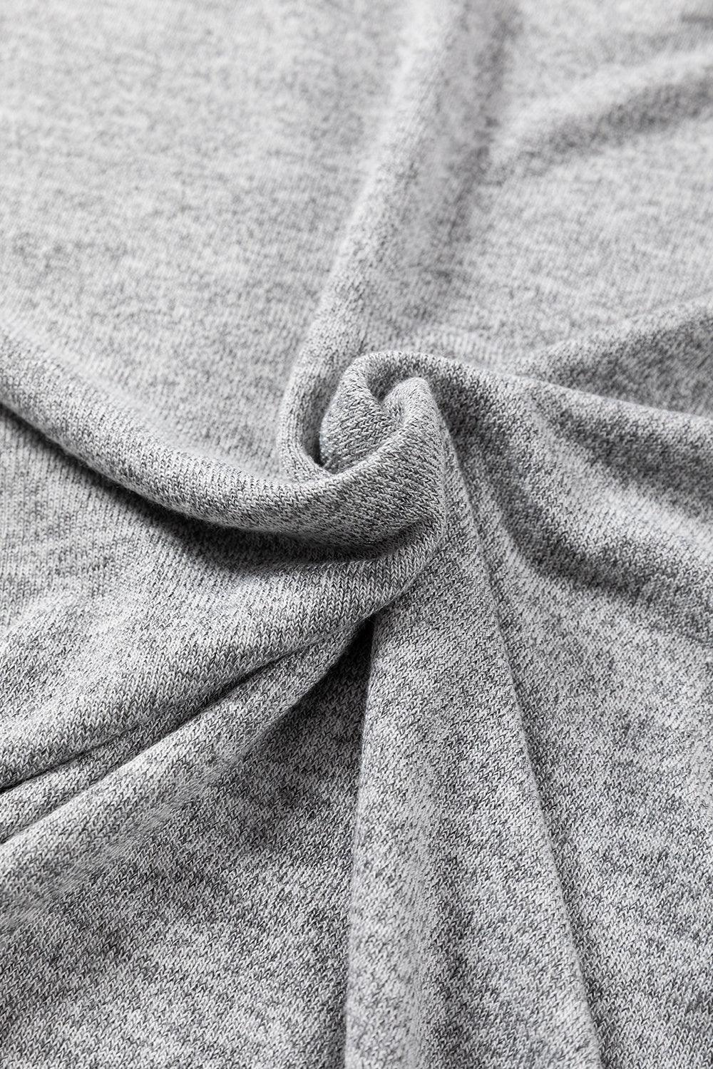 a close up view of a grey fabric