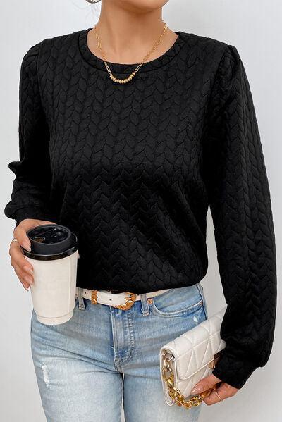 a woman holding a cup of coffee and a purse