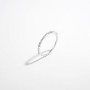 a diamond ring on a white background