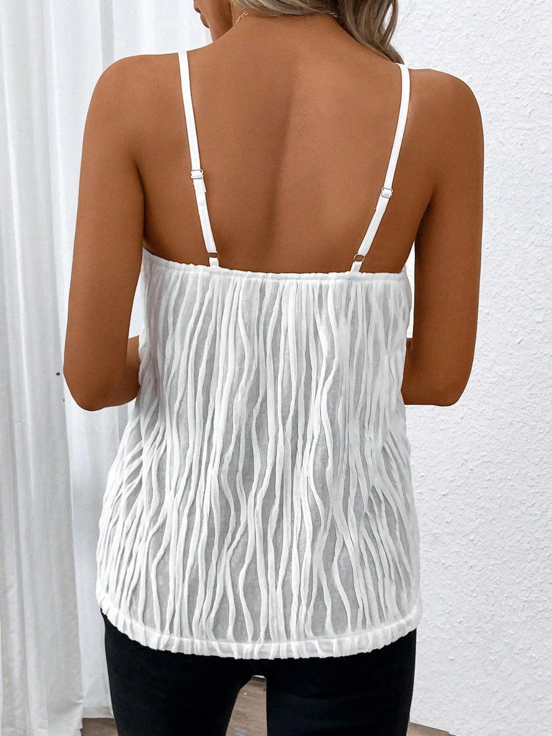 the back of a woman wearing a white top