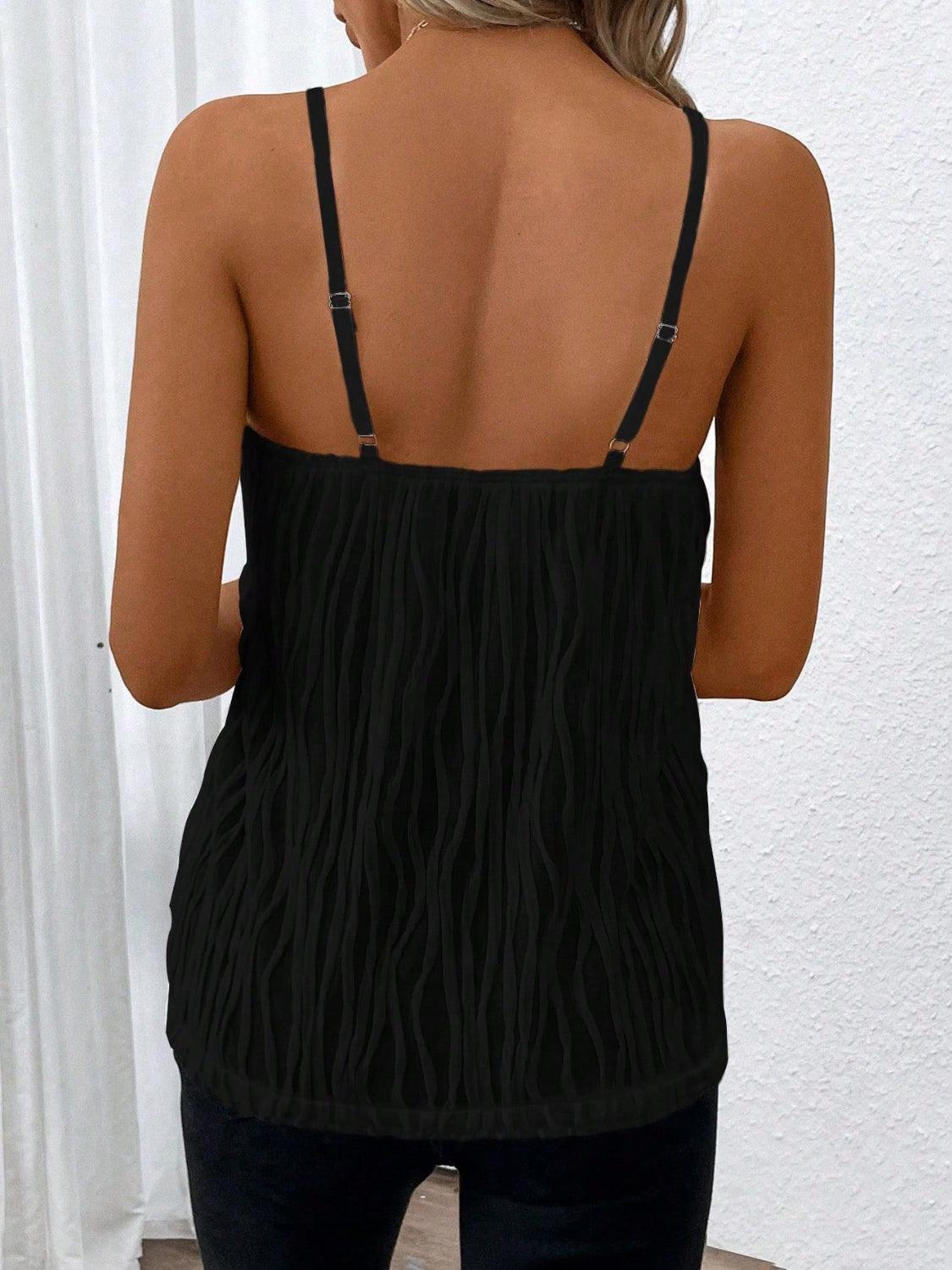 the back of a woman wearing a black top