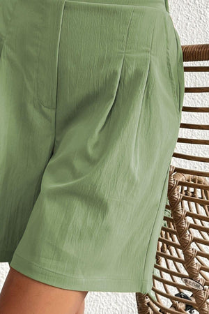 a close up of a person wearing a green shorts