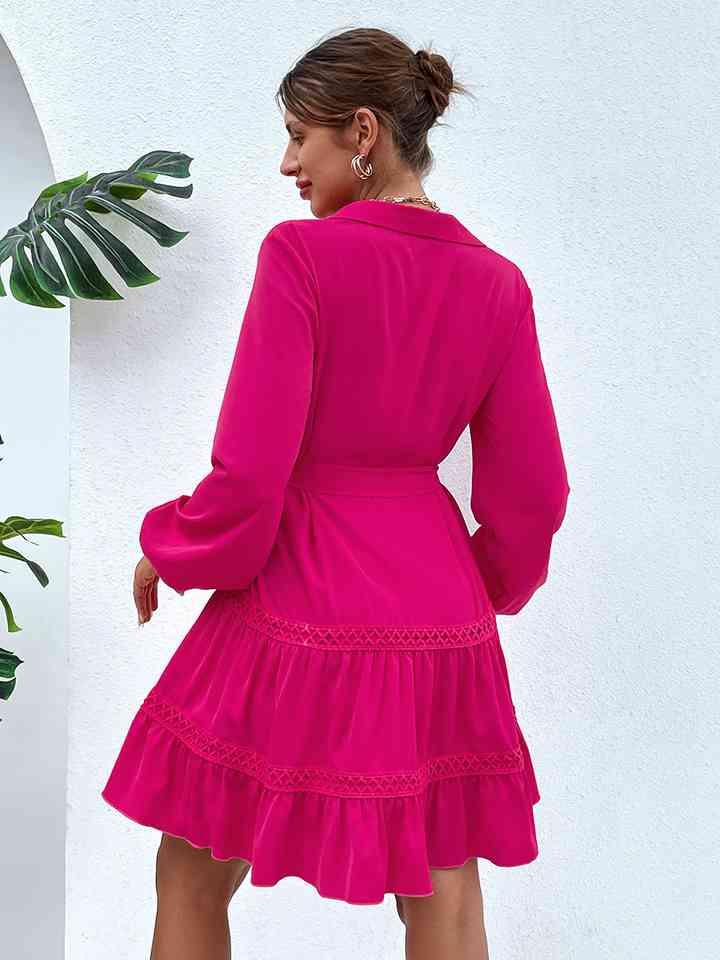 a woman in a bright pink dress