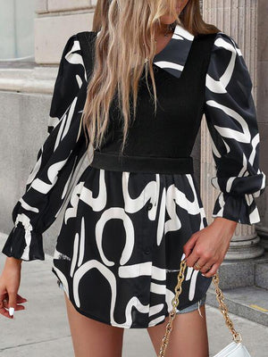 a woman in a black and white dress is holding a white purse