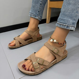 a close up of a person wearing sandals