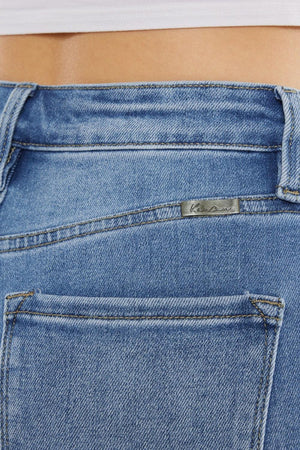 a close up of a person's stomach wearing jeans