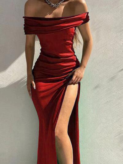 a woman in a red dress posing for a picture