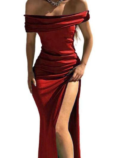 a woman in a red dress with a slit