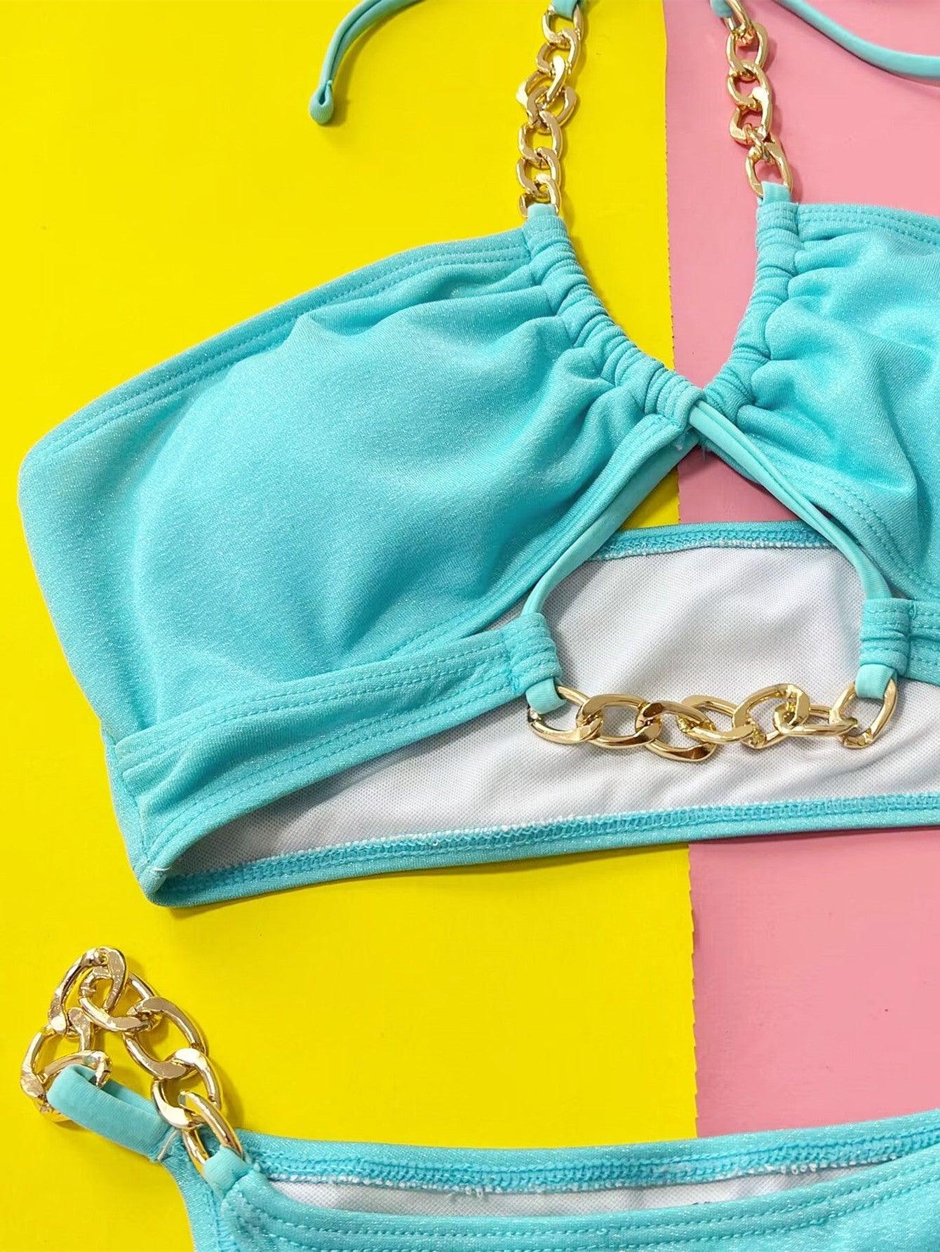 a bikini top with a chain attached to it