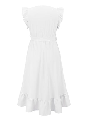 a white dress with ruffles on the shoulders