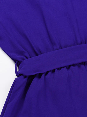 a close up of a purple dress on a white background