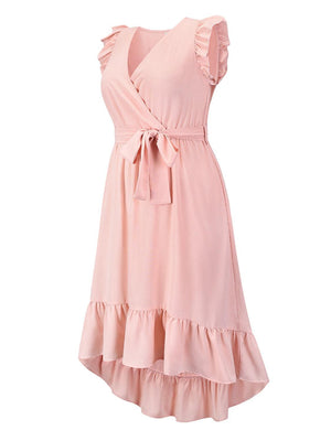 a pink dress with ruffles on it