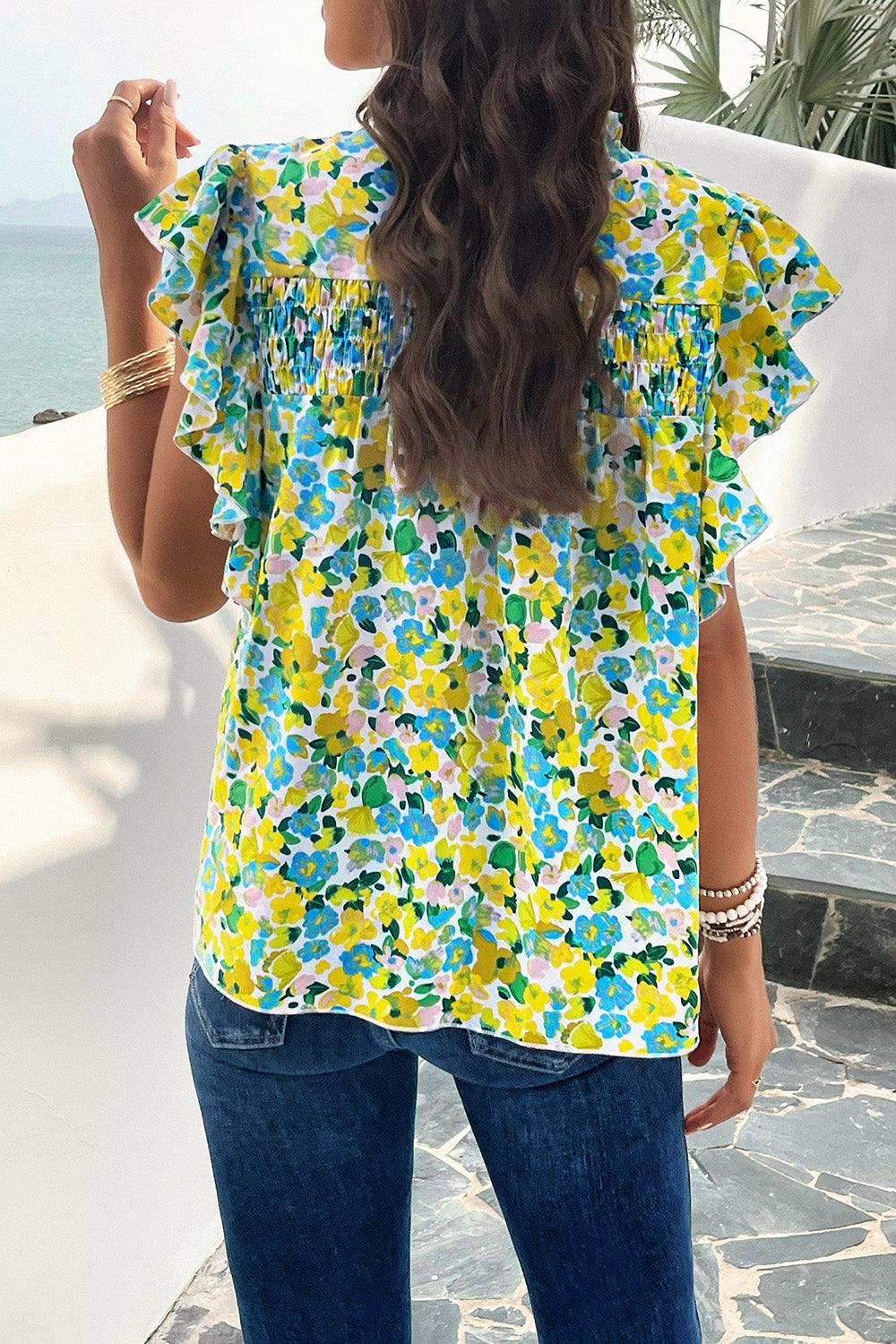 a woman with long hair standing on a balcony next to the ocean