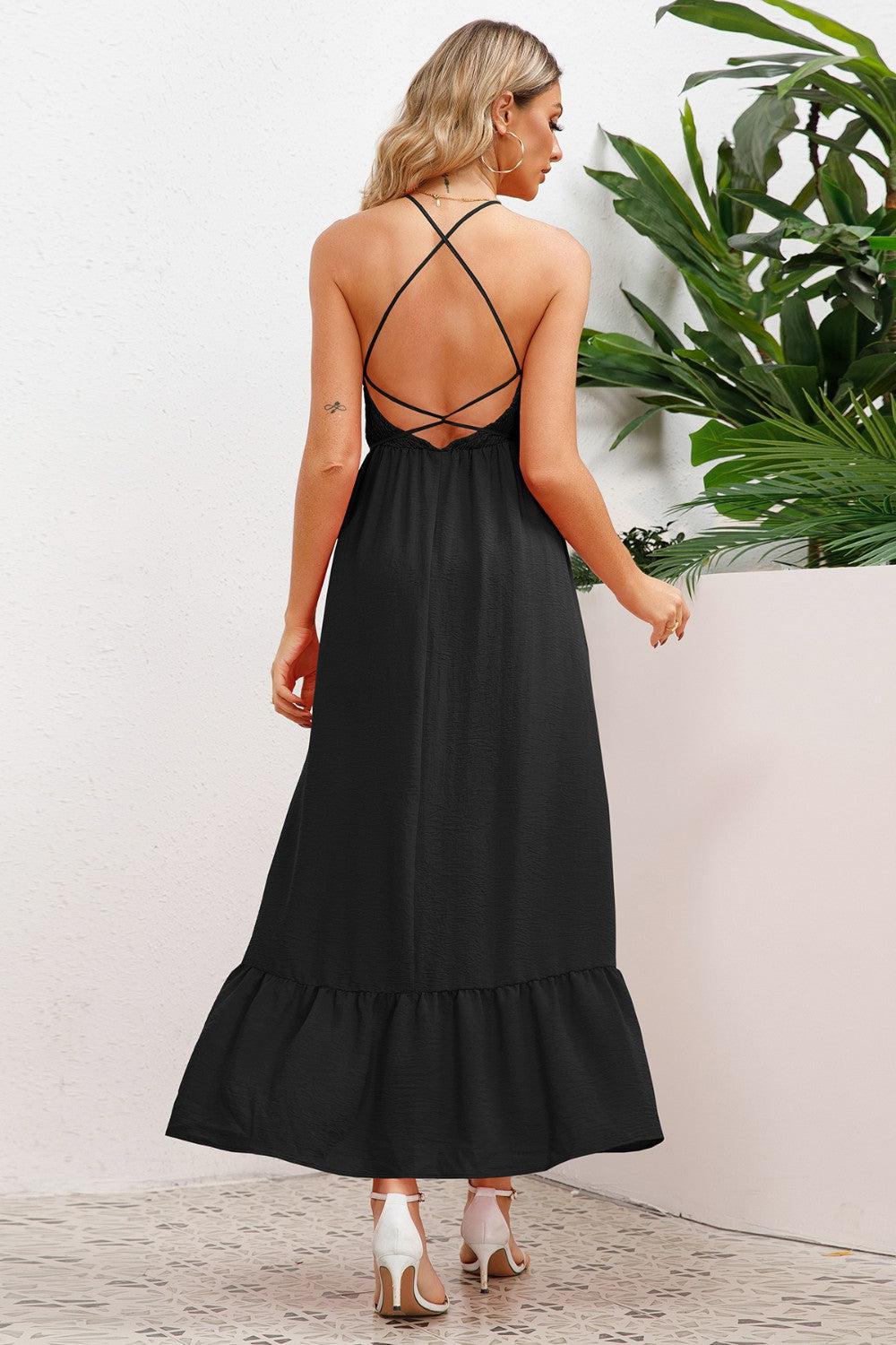 the back of a woman wearing a black dress