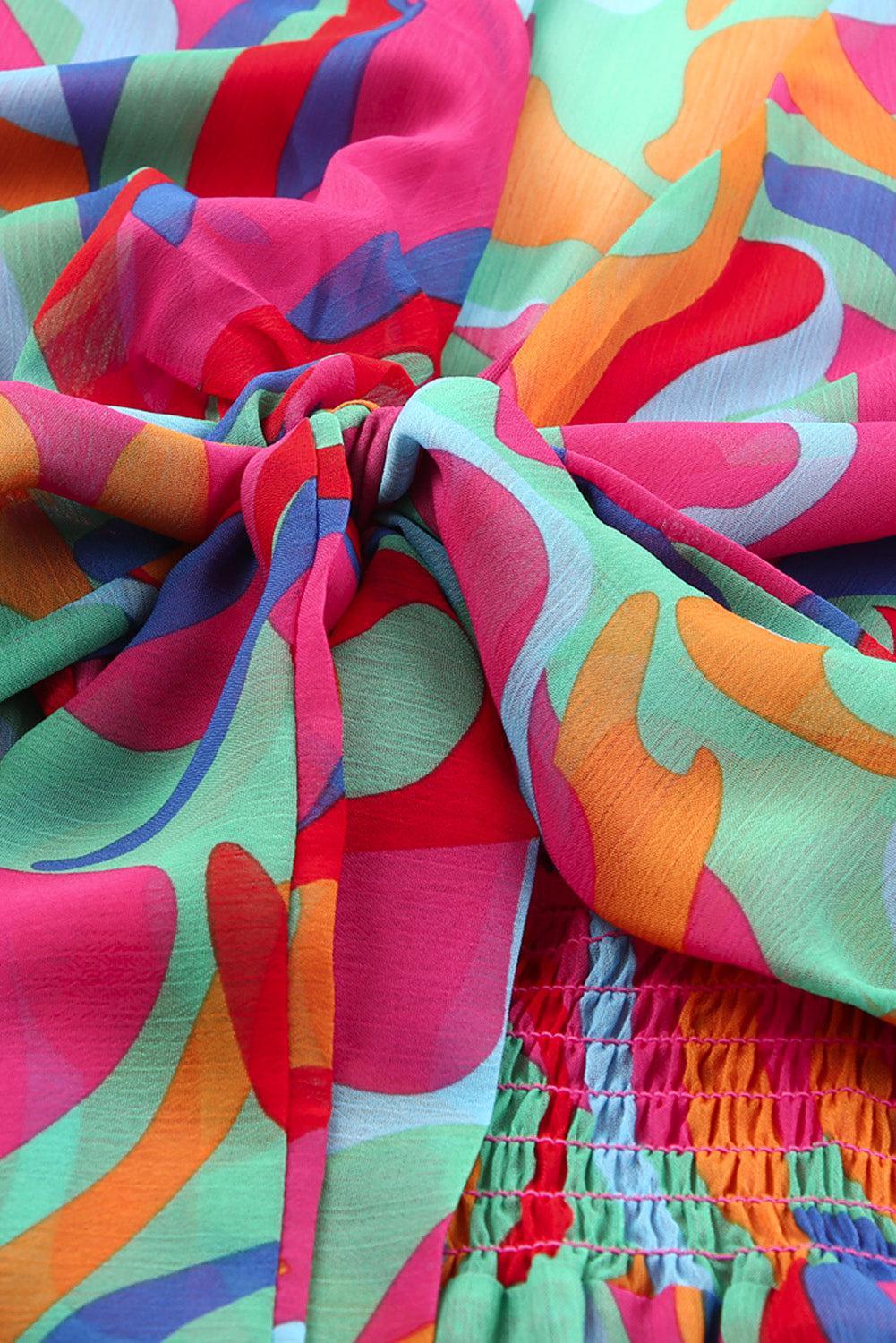 a close up of a colorful cloth with a tie
