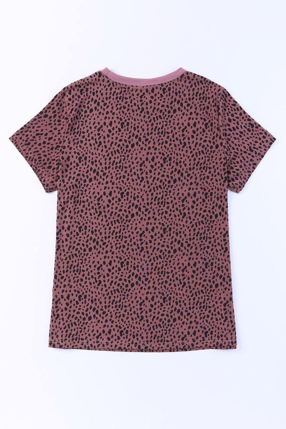 a t - shirt with a pink and black animal print