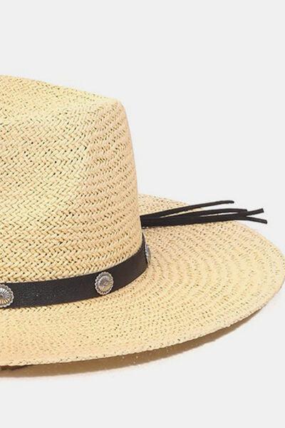 a straw hat with a black ribbon around the brim