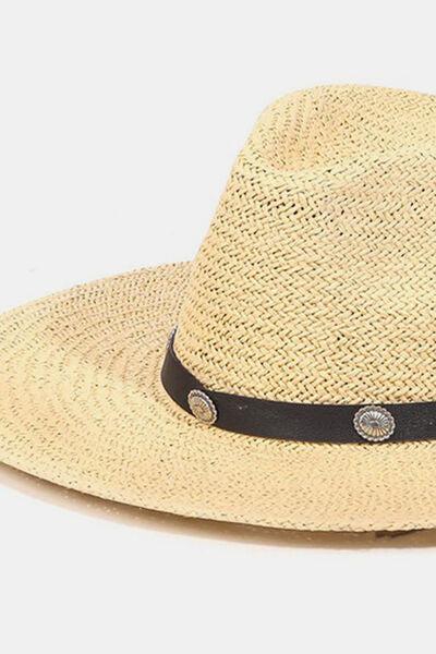a straw hat with a leather band