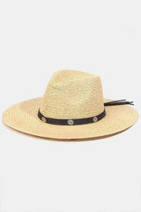 a straw hat with a black ribbon around the brim