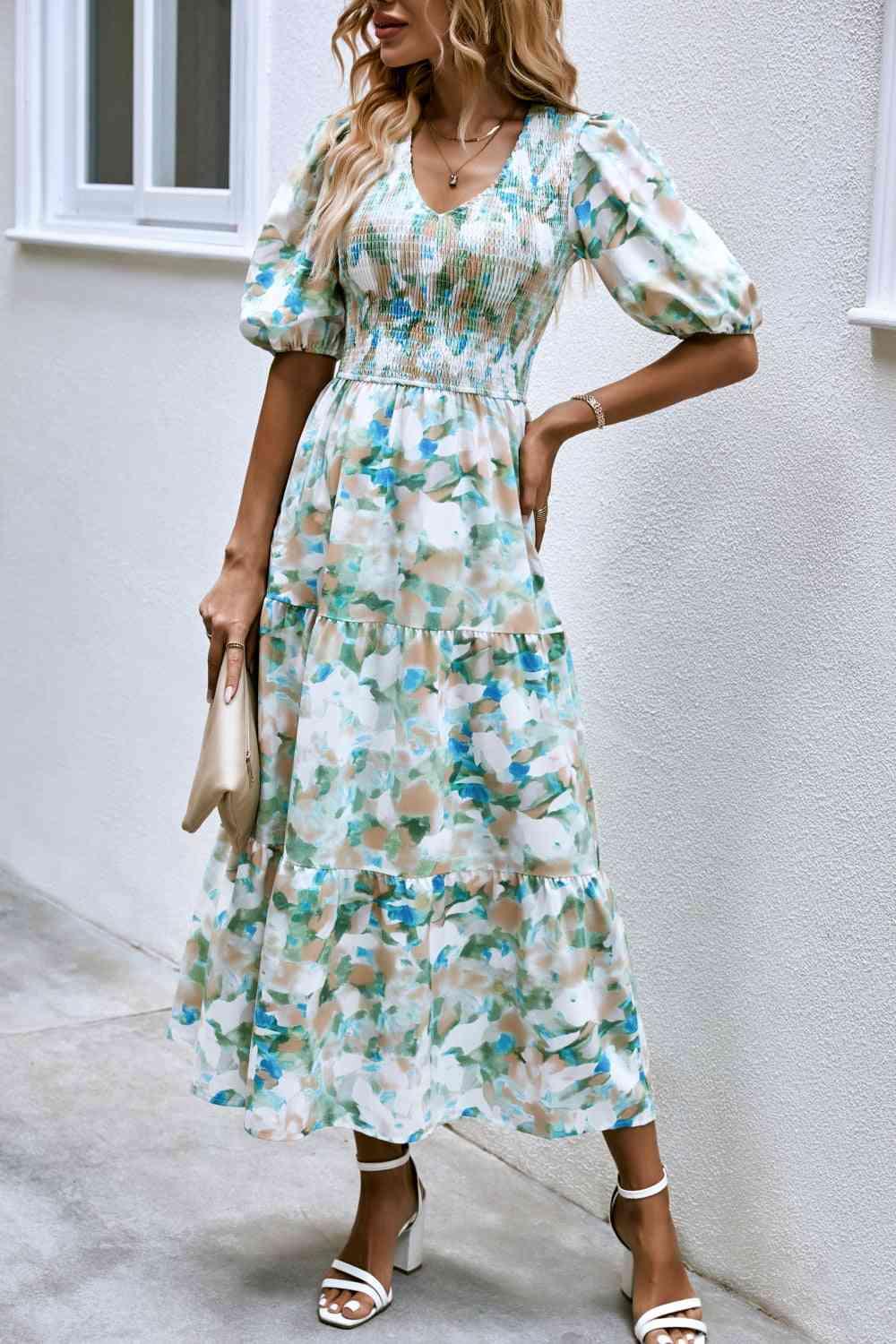 a woman in a floral print dress