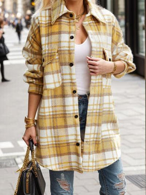 a woman is walking down the street with a handbag