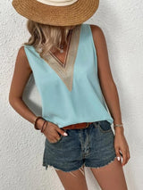 a woman wearing a straw hat and denim shorts