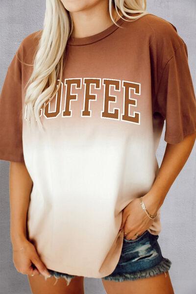 a blonde woman wearing a coffee t - shirt