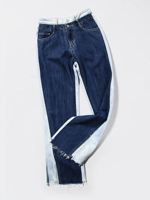 a pair of blue jeans with a white stripe on the side