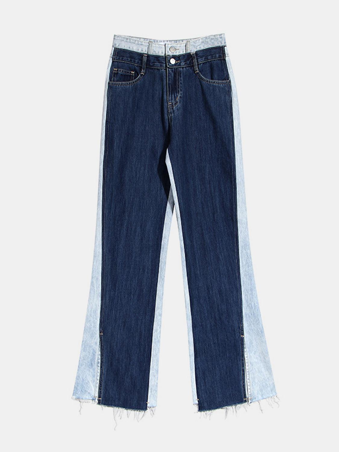 a pair of jeans with fraying on the side